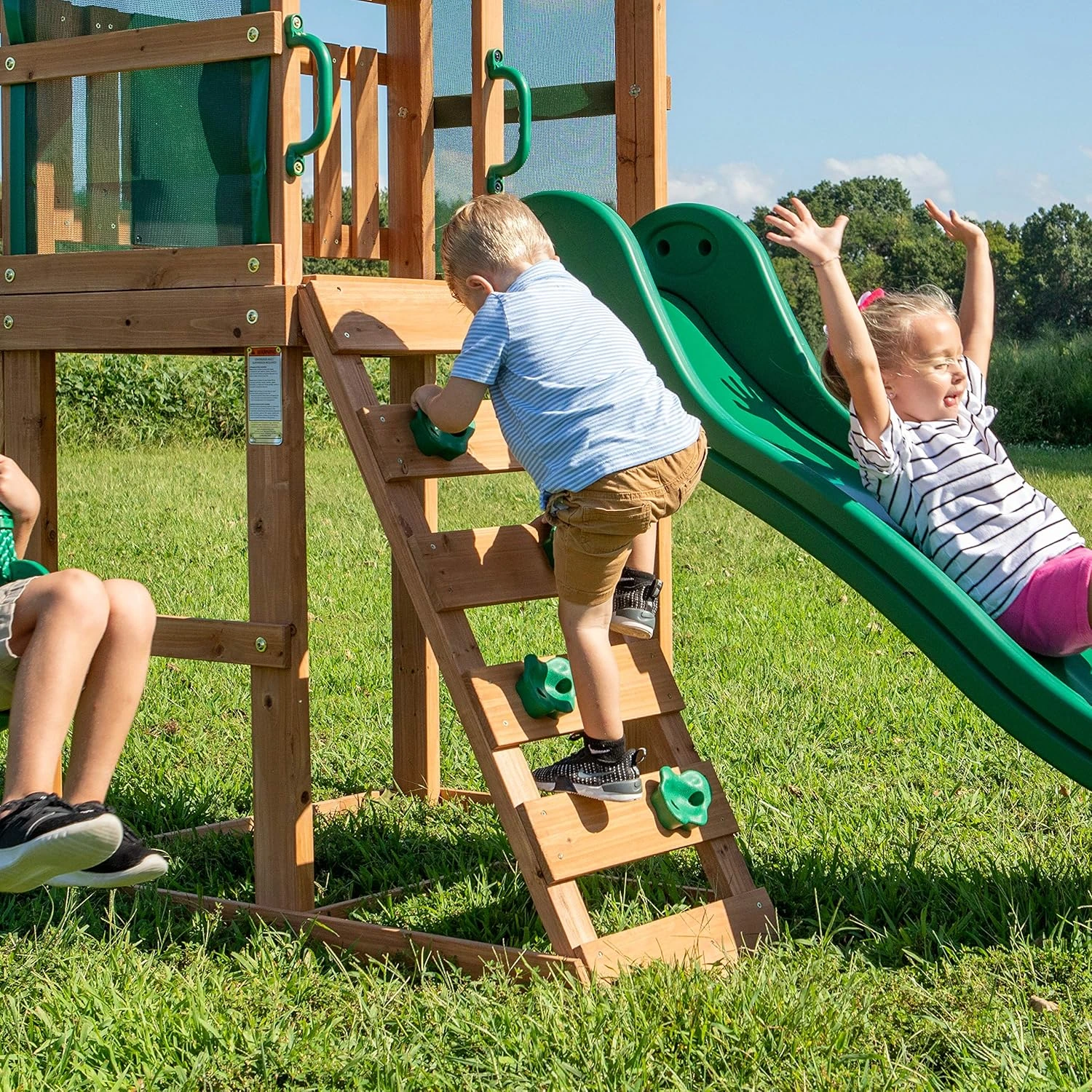 Backyard Discovery Buckley Hill Cedar Wood Swing Set with Wave Slide, Play Deck, Rock Wall Ladder, Belt Swings, Chalkboard, Canopy Roof, Outdoor Playset - Image 5