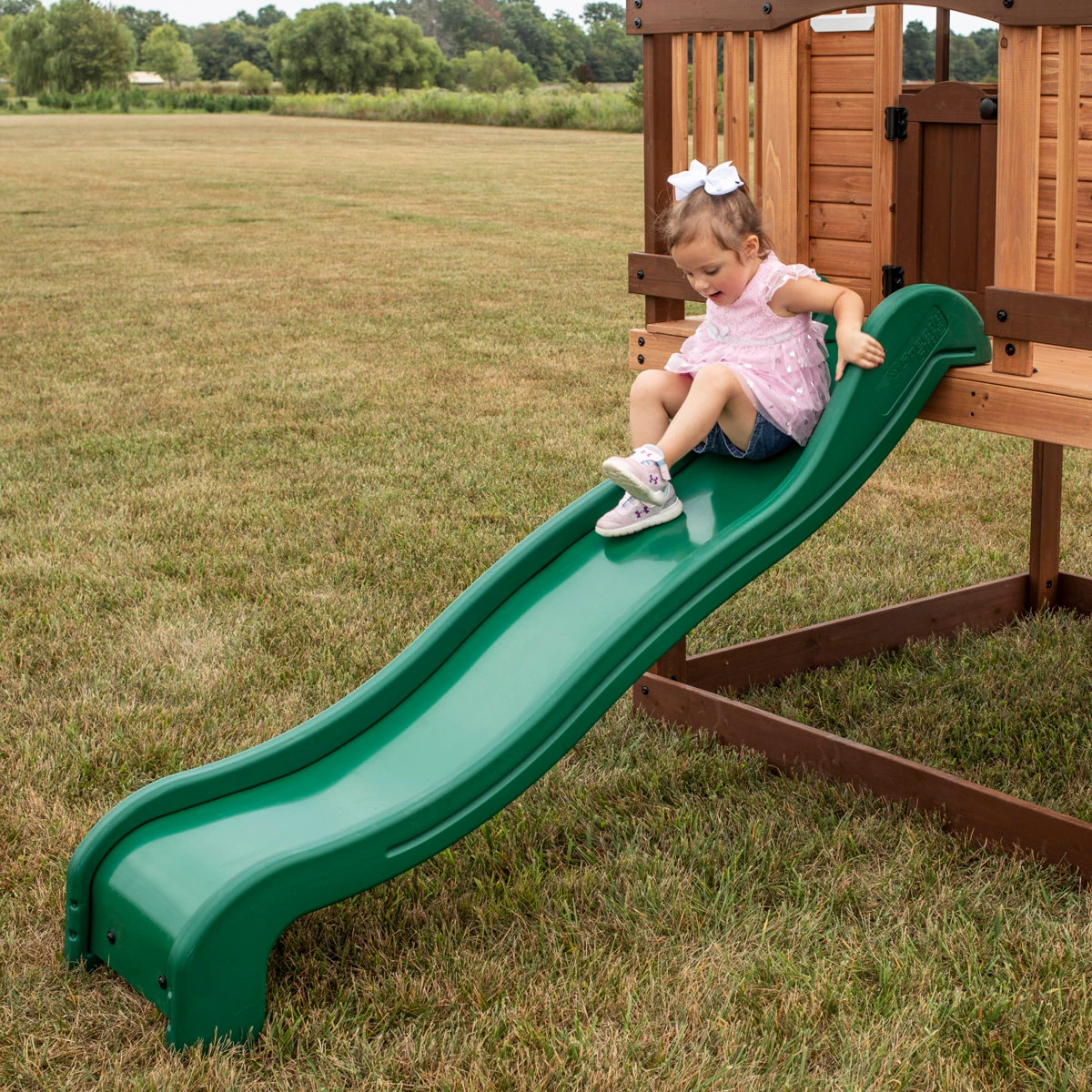Backyard Discovery Echo Heights Cedar Wooden Elevated Kids Playhouse with Wave Slide, Play Kitchen, and Deck - Image 10