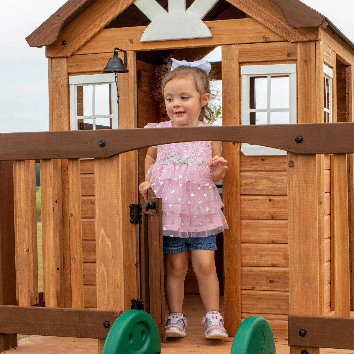 Backyard Discovery Echo Heights Cedar Wooden Elevated Kids Playhouse with Wave Slide, Play Kitchen, and Deck - Image 2