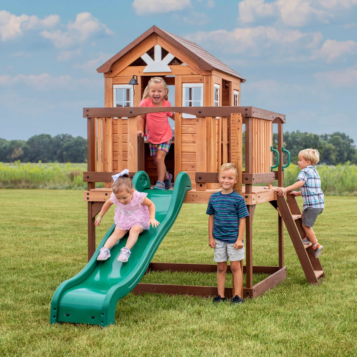 Backyard Discovery Echo Heights Cedar Wooden Elevated Kids Playhouse with Wave Slide, Play Kitchen, and Deck - Image 3