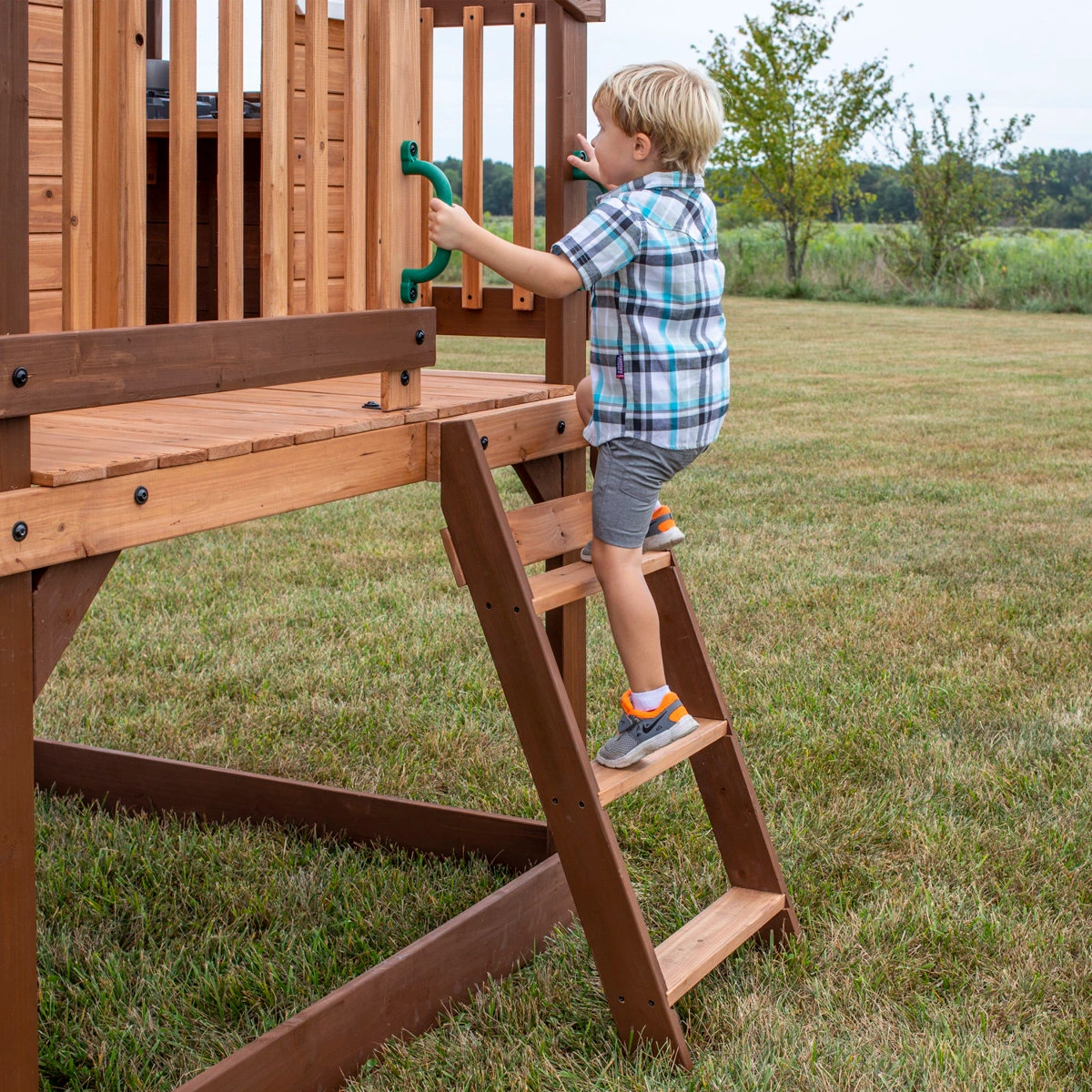 Backyard Discovery Echo Heights Cedar Wooden Elevated Kids Playhouse with Wave Slide, Play Kitchen, and Deck - Image 5