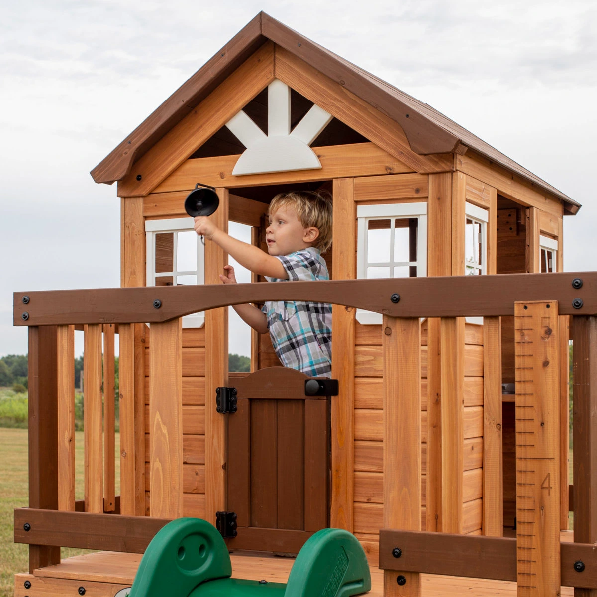 Backyard Discovery Echo Heights Cedar Wooden Elevated Kids Playhouse with Wave Slide, Play Kitchen, and Deck - Image 7