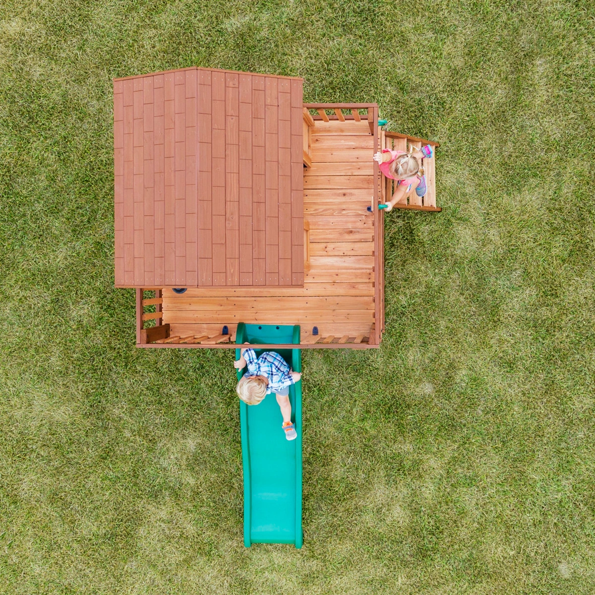 Backyard Discovery Echo Heights Cedar Wooden Elevated Kids Playhouse with Wave Slide, Play Kitchen, and Deck - Image 9