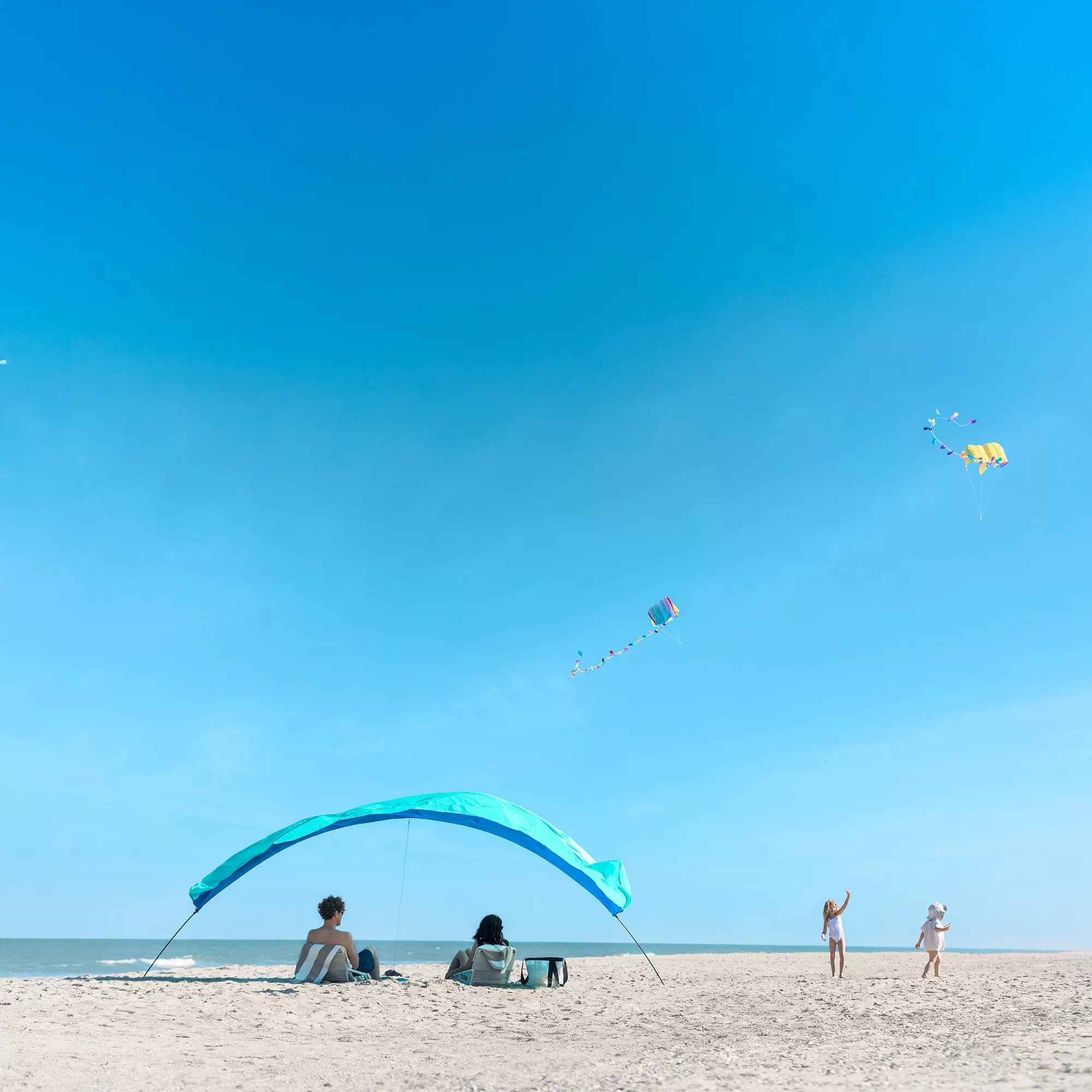 Shibumi Shade Classic Bundle with Quiet Canopy, the Original Wind-Powered Beach Shade, Provides 150 Sq. Ft. of Shade, Weighs Only 4 Lbs, Sets up in 3 Min - Image 9